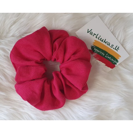 Ryškiai rožinė plaukų gumytė